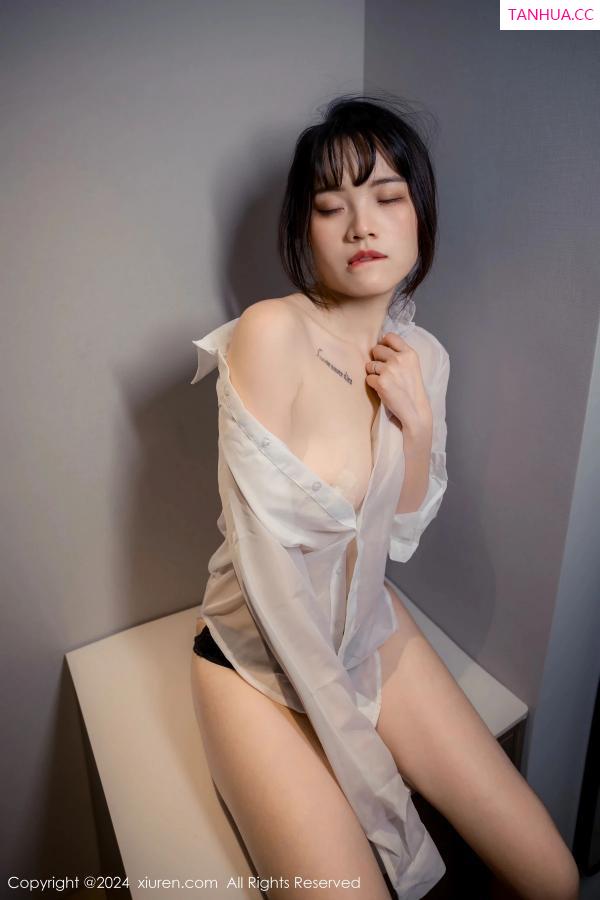   [XiuRen]高清写真图 2024.04.01 No.8320 唐安诺 黑丝美腿第46张图片
